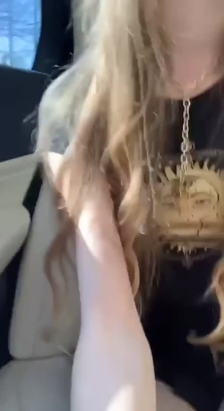 Cute girl rubbing pussy in car