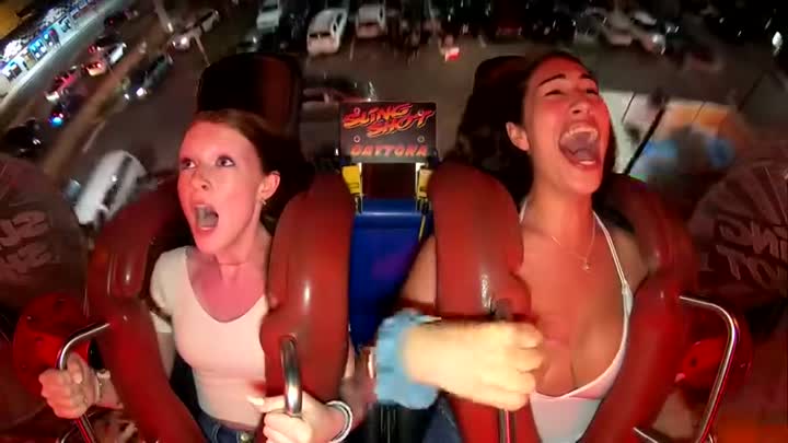 Girls tits almost bust out slingshot ride